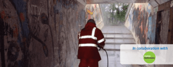 Graffiti being removed from underpass